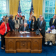 President Joe Biden is joined by Vice President Kamala Harris, Secretary of Interior Deb Haaland, Senator Tom Carper (D-DE), Senator Chris Coons (D-DE), House Majority Whip Jim Clyburn (D-SC), Rep. Lisa Blunt Rochester (D-DE), Rep. Eleanor Holmes Norton (D-DC), Delaware Supreme Court Justice CJ Seitz, Jr. and others as he signs the Brown v. Board of Education National Historical Park Expansion and Redesignation Act.